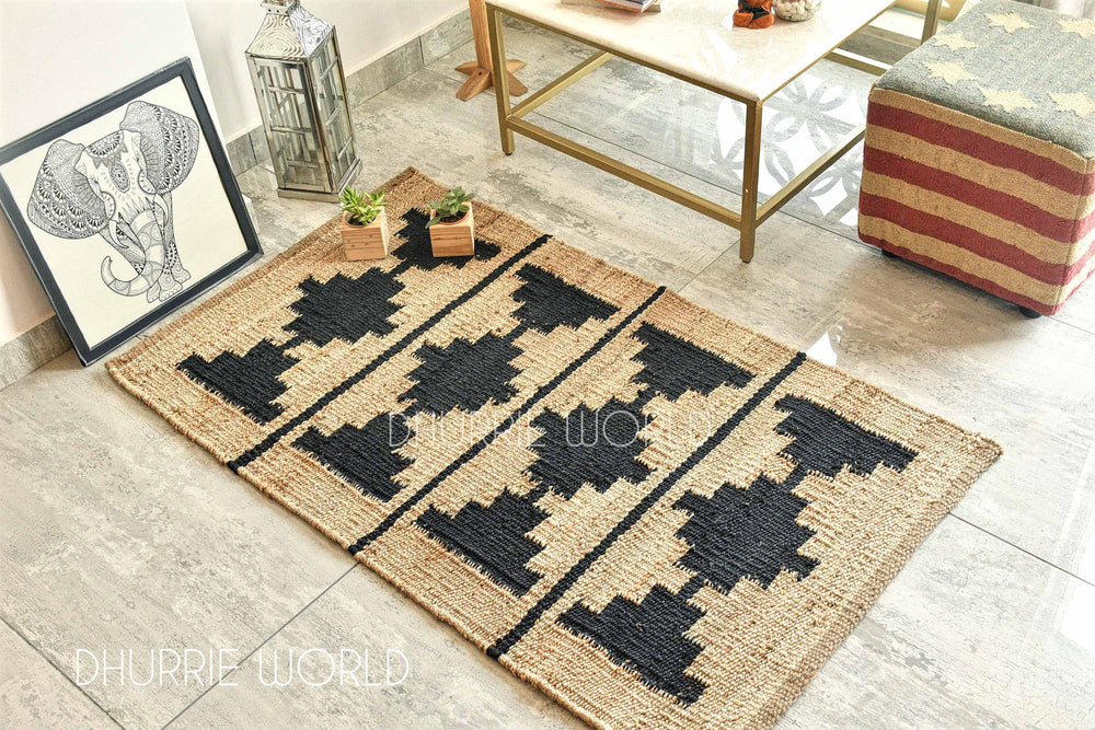 Rug with black geometric pattern on beige background