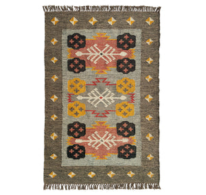 Wool Jute Kilim rug with geometric pattern on a white background