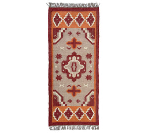 Jute Kilim runner rug with geometric pattern on a white background