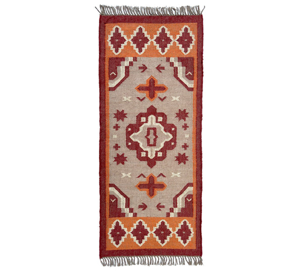 Jute Kilim runner rug with geometric pattern on a white background