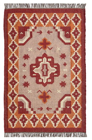 Decorative jute kilim rug with geometric pattern on a plain background