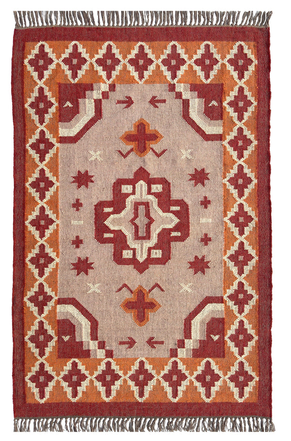 Decorative jute kilim rug with geometric pattern on a plain background
