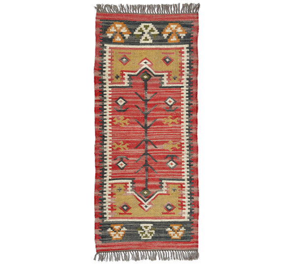 Decorative Kilim rug with geometric pattern on a white background