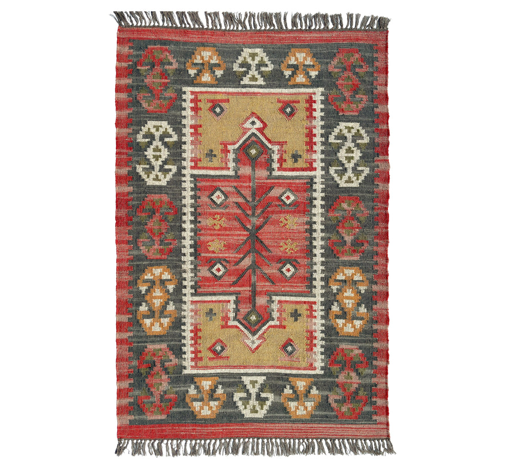 Decorative Jute Kilim rug with intricate patterns on a white background