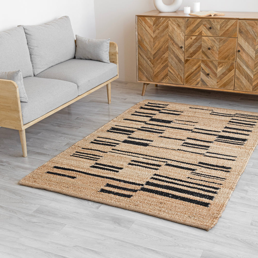 Beige Jute rug with black geometric pattern on a white background