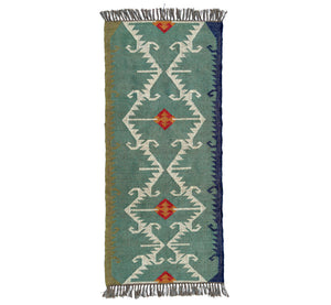 Woven Kilim runner rug with geometric pattern on a white background
