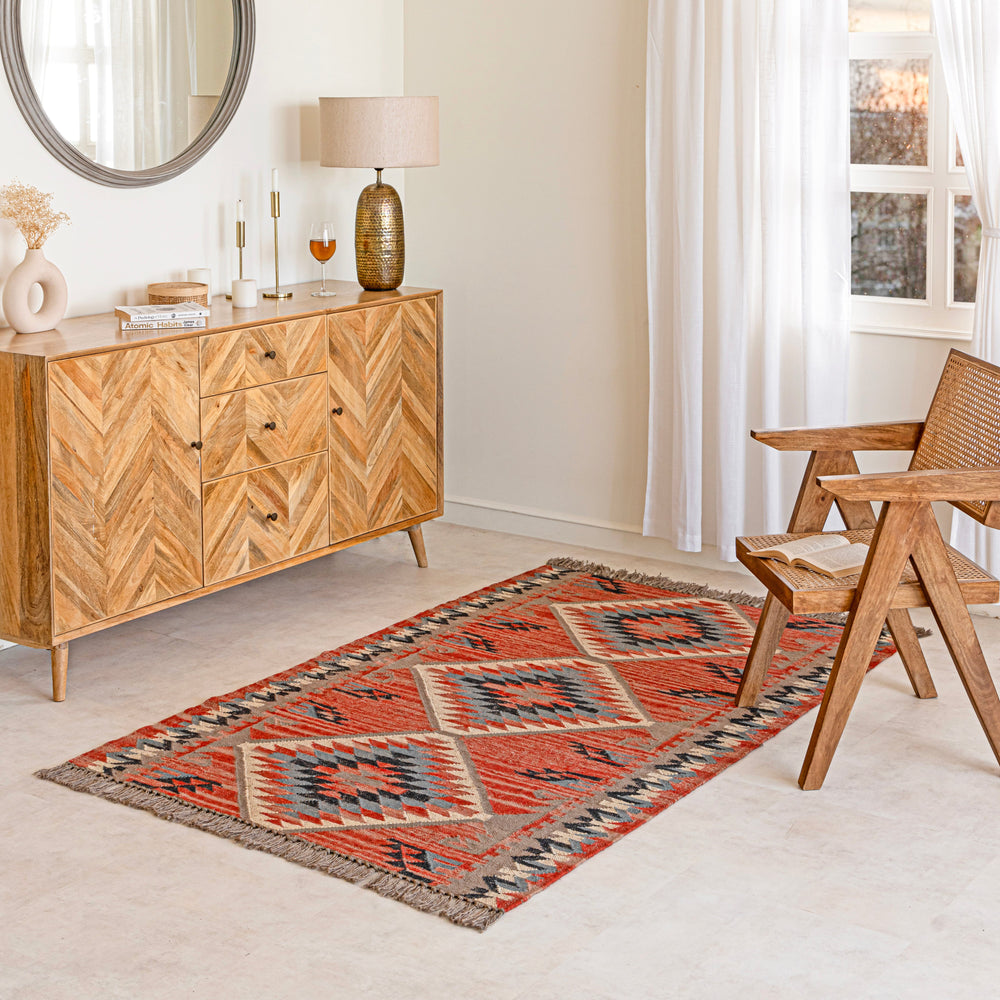 Woven Wool Jute kilim rug with geometric pattern on a white background